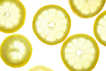 Bright lemon slices on light background, citrus pattern