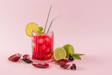 Refreshing hibiscus and lime tea with vibrant presentation