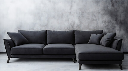 Grey corner sofa against concrete wall with copy space, minimalist home interior design of modern living room
