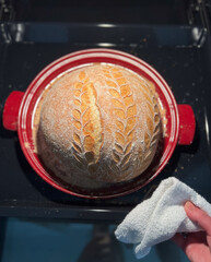 Savor the delightful taste of freshly baked artisan bread made in a Dutch oven today