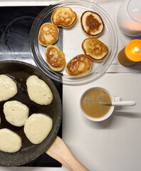 A delightful and appetizing scene featuring delicious pancakes accompanied by coffee for breakfast
