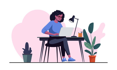 Creative black woman Working on Laptop in a Modern office Setting