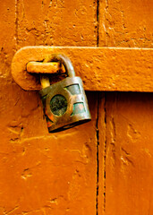 old lock on a wooden door