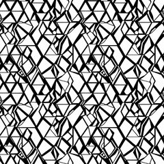 a black and white image of a mosaic pattern