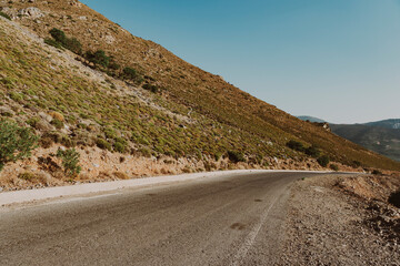 Asphalt road throug Mountainous landscape of the Greek island of Crete