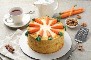 Delicious homemade carrot cake served on light grey table