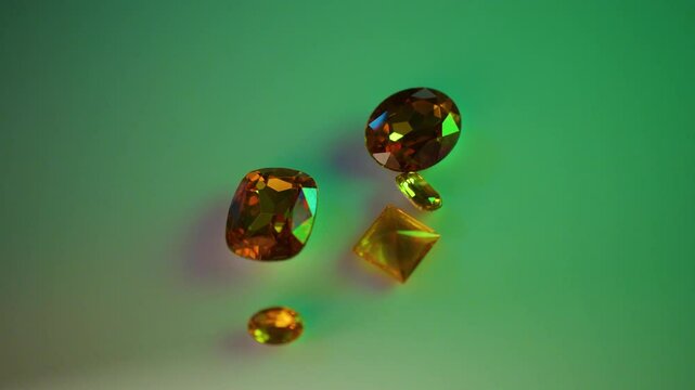 Gemstones on a white table in multicolor illumination