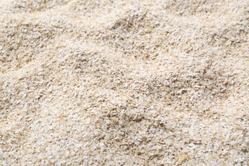 Superfood product. Oat powder as background, closeup