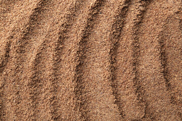 Superfood product. Flaxseed powder as background, closeup
