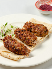 Lula kebab on lavash close up