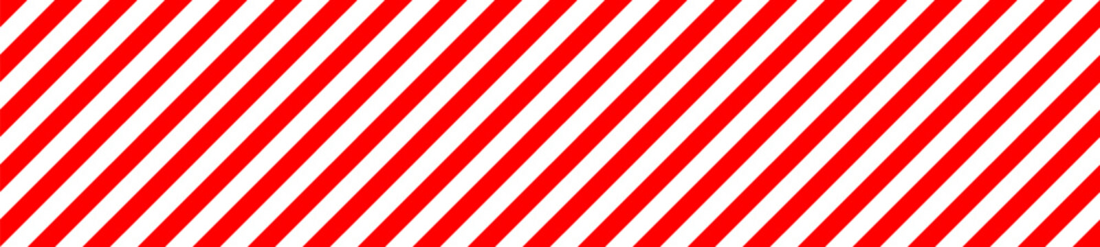 Diagonal red and white striped pattern. Classic candy cane inspired design. Bold eye-catching backdrop. Perfect for holiday themes, warnings, graphic design elements. Seamlessly loopable.
