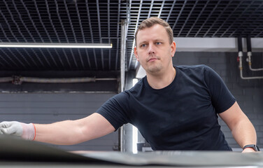 The process of installing PPF, armored film on the car. PPF is a polyurethane, protective film that...
