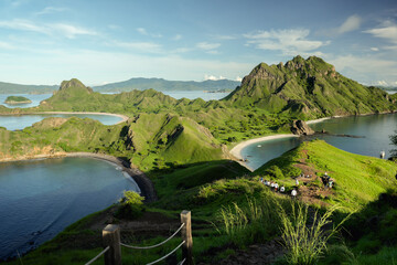 Labuan Bajo, Padar Island - 25 January 2025: Morning Clear blue sky and sea During green session at Padar island, Flores, Indonesia