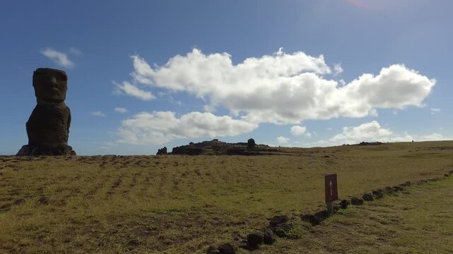 Explore the majestic moai statue standing on Easter Island with breathtaking landscapes and rich history
