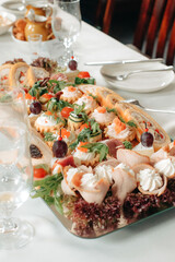 Close-up of rustic finger food at event – savory snacks served at a country-style celebration, perfect for casual gatherings