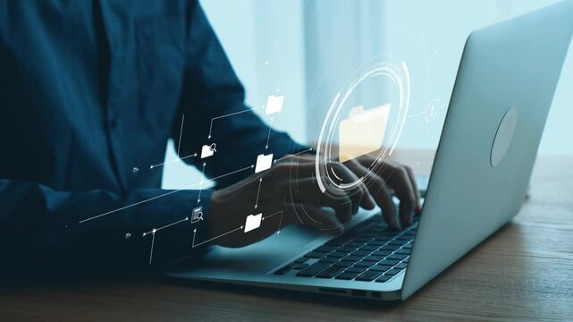 Business person managing online documents folders for efficient work processes. Ensure secure and quick access to all your important online documents with ease. UUID