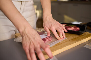 Sealing Fresh Meat for Preservation Using a Vacuum Sealer for Longer Lasting Freshness