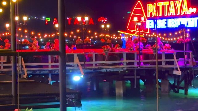 1 April 2025 colourful restaurant lights on Walking Street in Pattaya full of bars agogo clubs strip clubs restaurants street food and tourism in Pattaya Thailand