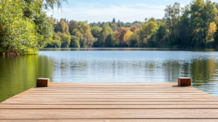 Obraz premium Serene autumn lake view with wooden dock extending into calm reflective waters