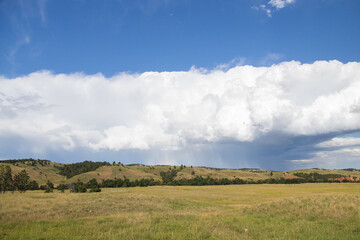 Obraz premium Landscape with clouds and rainbow