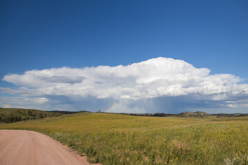 Fototapeta premium Clouds with rainbow