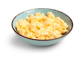 Bowl of tasty scrambled eggs on white background