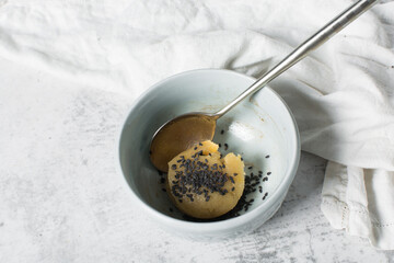 vanilla and black sesame sugar cookie dough, sesame coated sugar cookie dough about to be baked, process of making cookies