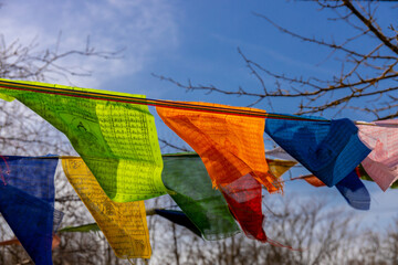 Colorful Tibetan flags. Prayer flags of yellow, white, blue, green and red color symbol of elements...