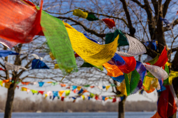 Colorful Tibetan flags. Prayer flags of yellow, white, blue, green and red color symbol of elements...