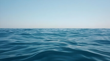 Obraz premium Vast Ocean Horizon Under A Light Blue Sky