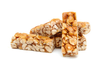 Honey bars with peanuts, sesame and sunflower seeds isolated