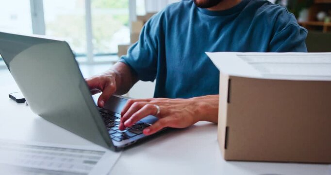 Box, laptop and hands of man with logistics email, order update and shipping schedule in home. Ecommerce, typing and computer for online sales, stock procurement and freelancer in export distribution