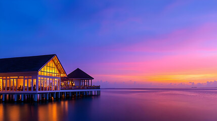 Obraz premium Luxury Water Restaurant Maldives Sunset Panorama