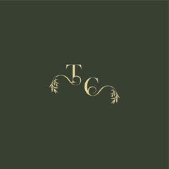 logo design concept luxury wedding monogram TC organic leaf initial letter