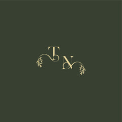 logo design concept luxury wedding monogram TN organic leaf initial letter