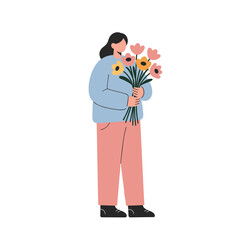 Person holding a bunch of flowers, smiling, in a simple background  