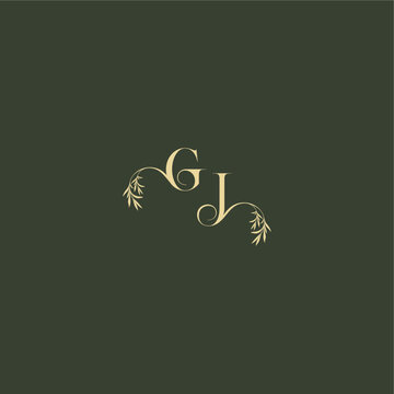 organic leaf initial logo design concept letter luxury wedding monogram GJ