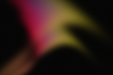 Abstract background with light waves in yellow and magenta tones on black. Diffused lighting with mix of warm colors in a blurred composition