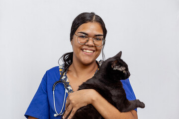 Portrait Of Happy Veterinarian Doctor Woman Holding A black pet, Posing With Healthy Patient Over...