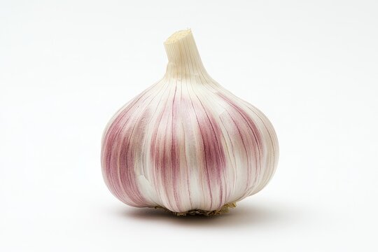 A close up shot of a single garlic bulb against white background