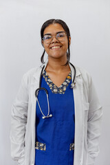 Medical concept of beautiful Brazilian female doctor in white coat with stethoscope, waist up....
