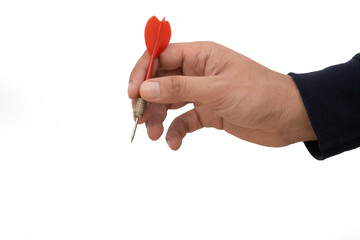 A close-up image of a hand holding a red dart, ready to be thrown. The focus on the dart highlights...