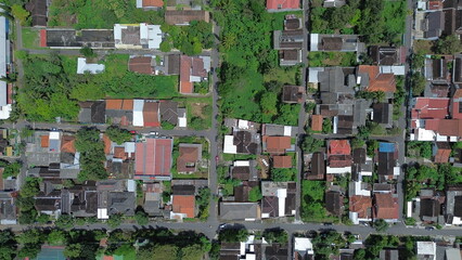 Aerial View of Indonesian Village with Traditional Rooftops