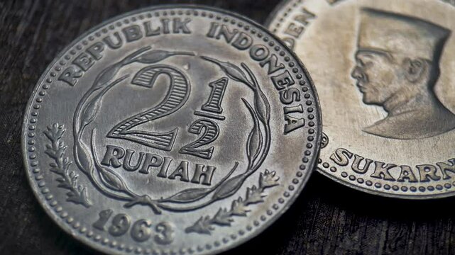 Sukarno pattern coin a 1963 indonesian 2.5 rupiah coin.