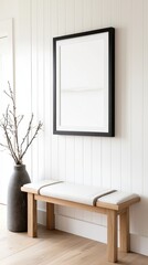 Minimalist Entryway with Abstract Artwork and Light Wood Bench