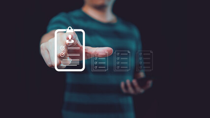 Man approves request for Human Resources (HR) corporate documents. Concept of using electronic...