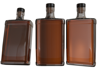 Three amber-colored rectangular glass liquor bottles