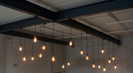 Industrial Studio With Black Steel Beam And Vintage Edison Bulbs Arrangement