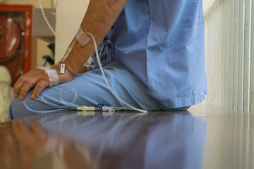 A patient in the hospital with saline intravenous