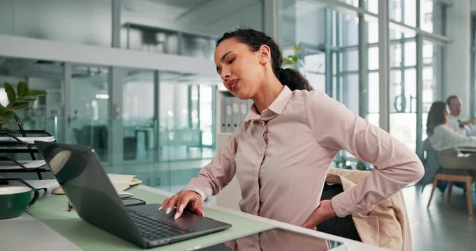 Business, laptop and woman with back pain in office for bad posture, muscle strain and discomfort. Corporate employee, person and stress for medical injury, inflammation and spinal pressure at desk